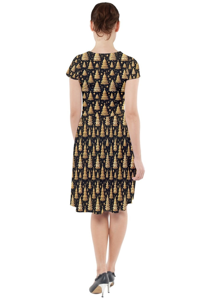 Back view of O Christmas Tree cap sleeve midi dress featuring festive black and gold tree pattern, perfect for holiday events.