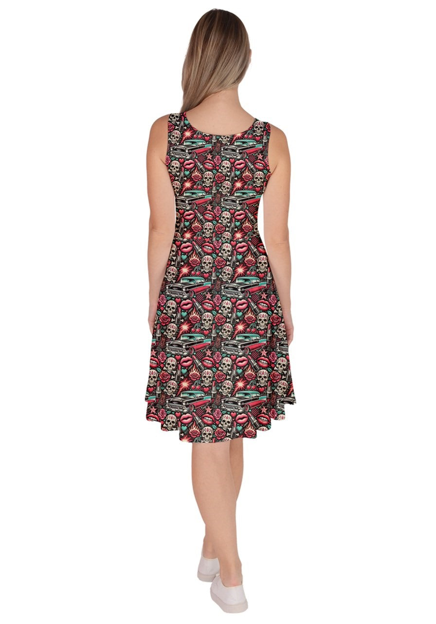 Back view of Rebel Rose knee length skater dress with skull and hotrod print, perfect for a rebellious style.