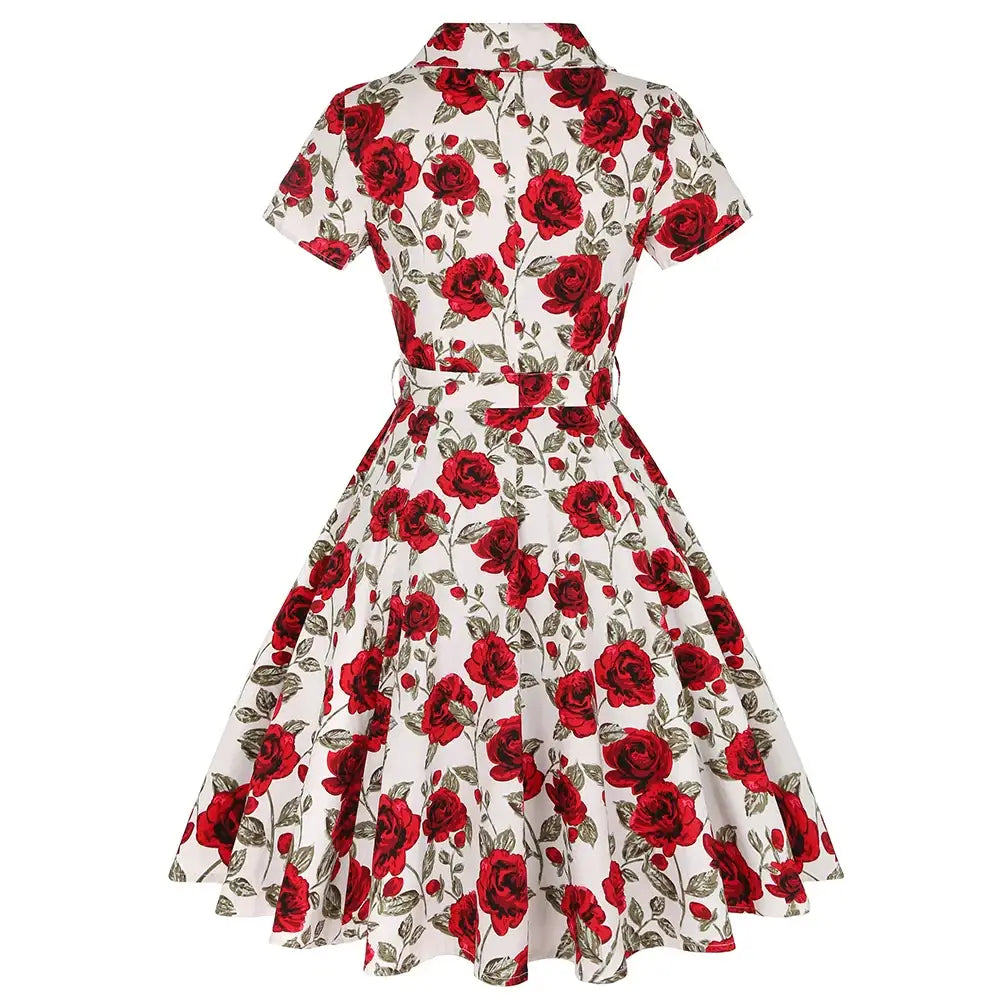 Back view of the Rose Romance Vintage Swing Dress featuring a floral pattern, short sleeves, and a belted waist.