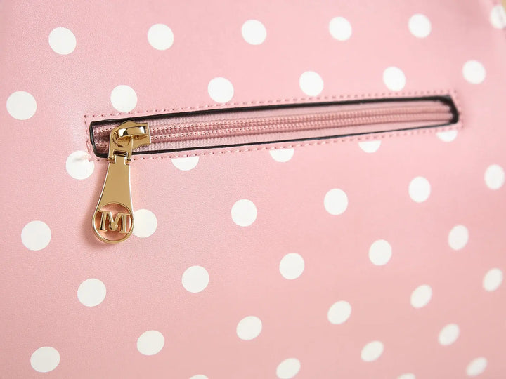 Close-up of Pink Polka Dot Handbag zipper with gold clasp, featuring a vintage design and stylish dots.