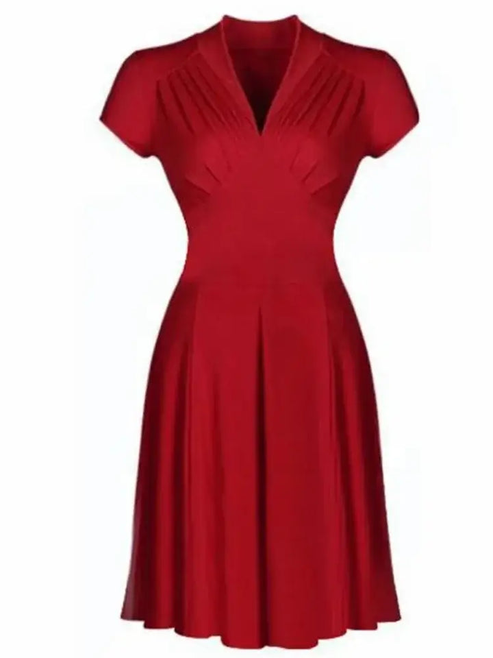 Timeless elegance vintage dress in red with cap sleeves and flattering silhouette, perfect for retro fashion lovers.