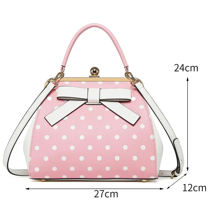 Pink polka dot handbag with a bow, featuring dimensions 27cm x 12cm x 24cm, perfect for vintage-inspired outfits.