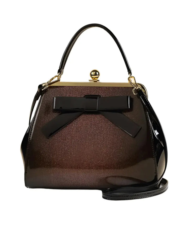 Chocolate Patent Rockabilly Handbag with bow, showcasing retro glamour and high-shine finish.