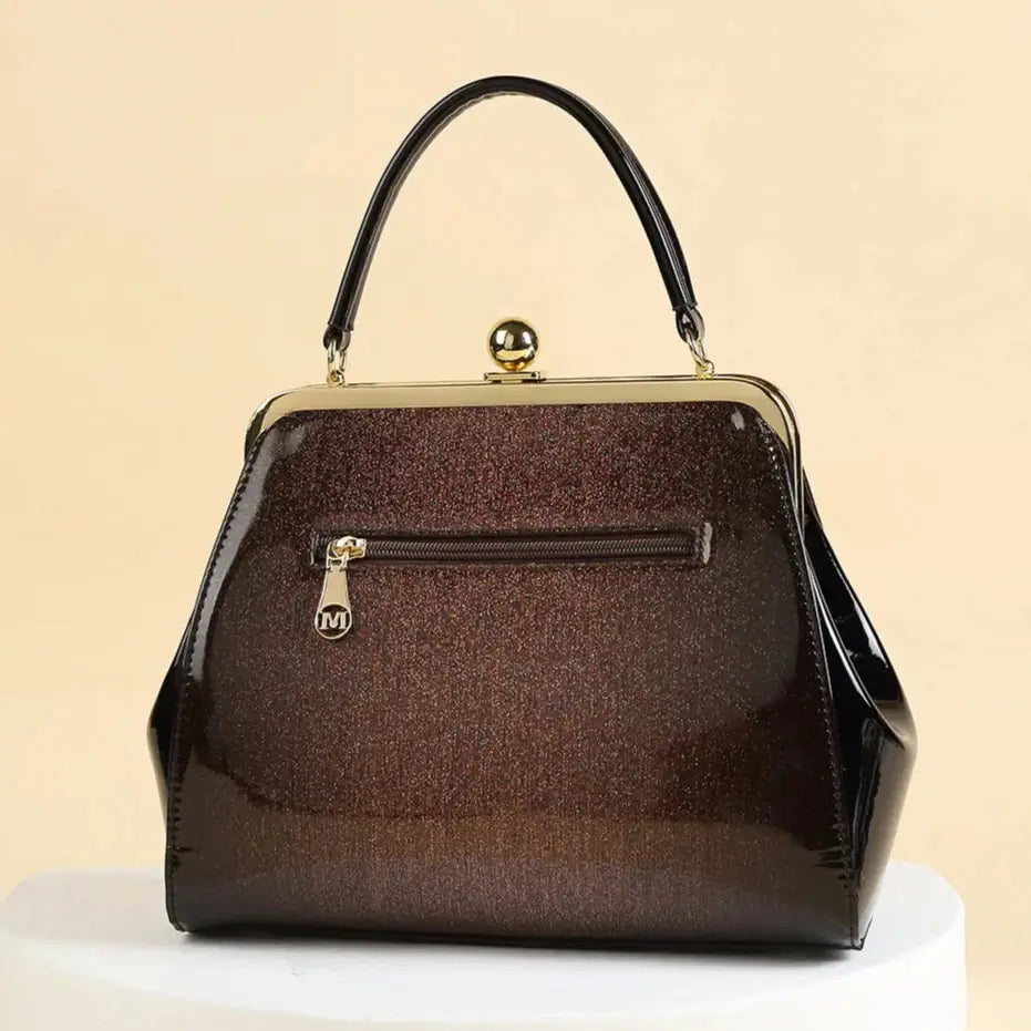 Chocolate Patent Rockabilly Handbag in high-shine vinyl, perfect for vintage style and retro outfits.