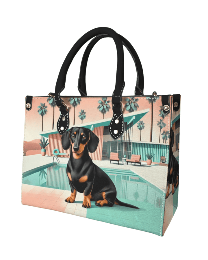 Palm Springs Dachshund bag featuring a black and tan dog with a retro mid-century modern design.