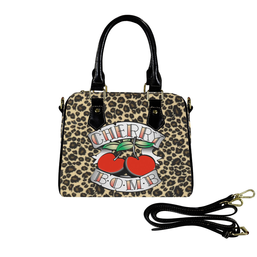 Cherry Bomb Handbag with leopard print and cherry design, perfect for adding bold style to any outfit.