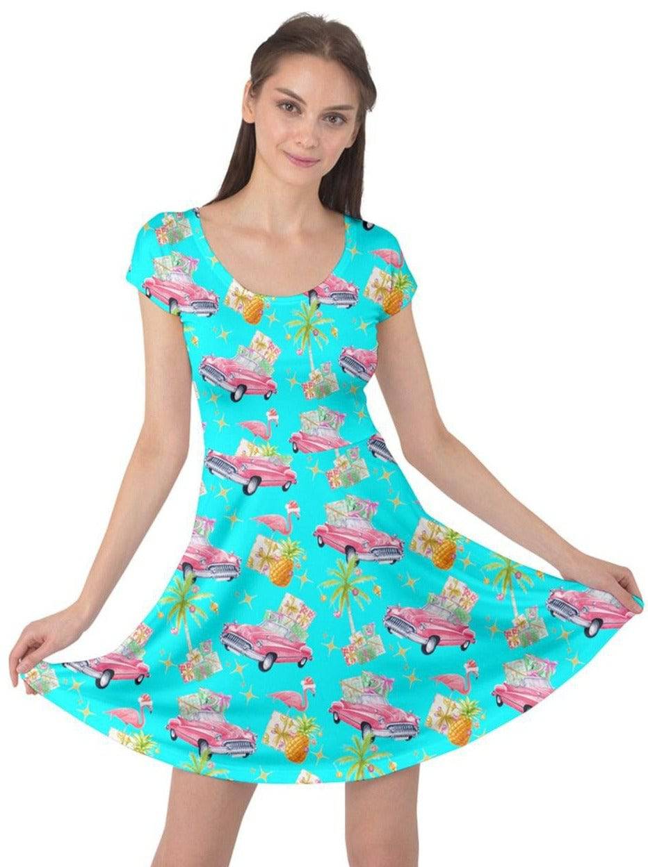 Tropical Christmas cap sleeve dress with flamingos, classic cars, and pineapples, perfect for festive celebrations.