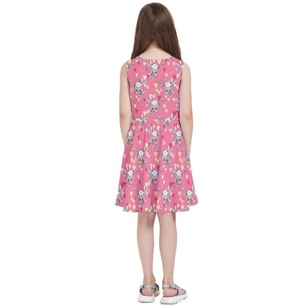 Back view of a pink floral kids' skater dress featuring whimsical rabbit designs, perfect for little girls.